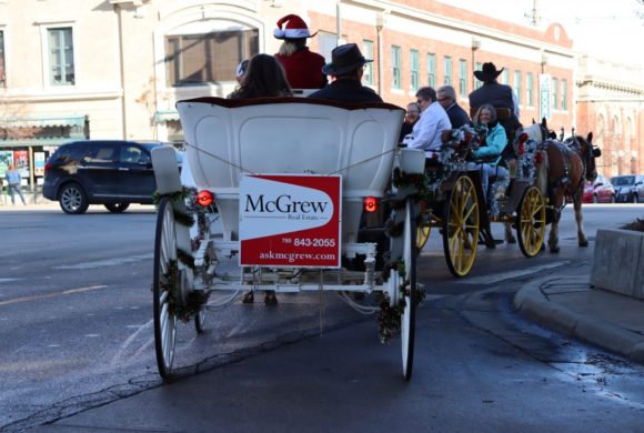Horse-drawn carriage rides raise money for homeless shelter
